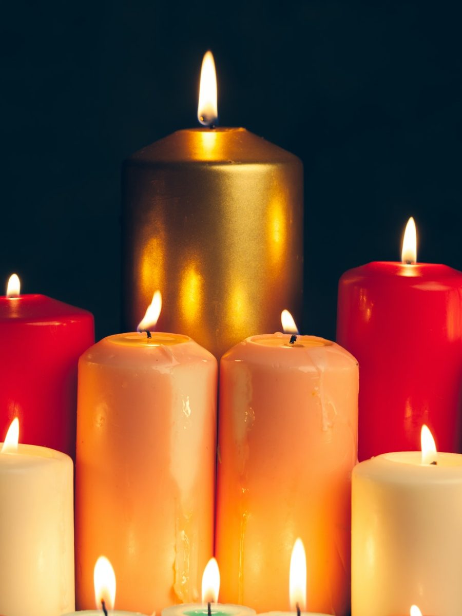 candles-burning-in-darkness-over-black-background-commemoration-concept.jpg